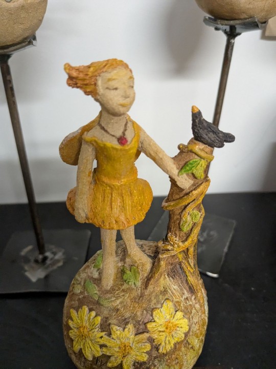 Petite fée avec son merle